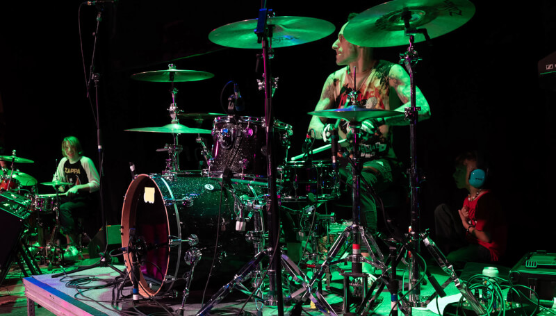School of Rock student drummer performs alongside drummer Frank Zummo